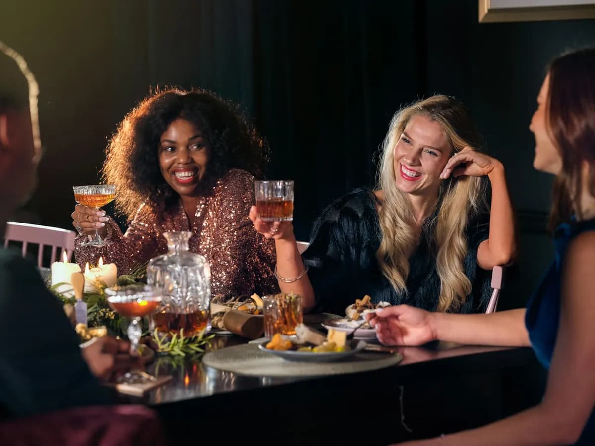 Friends sharing a warm dinner together